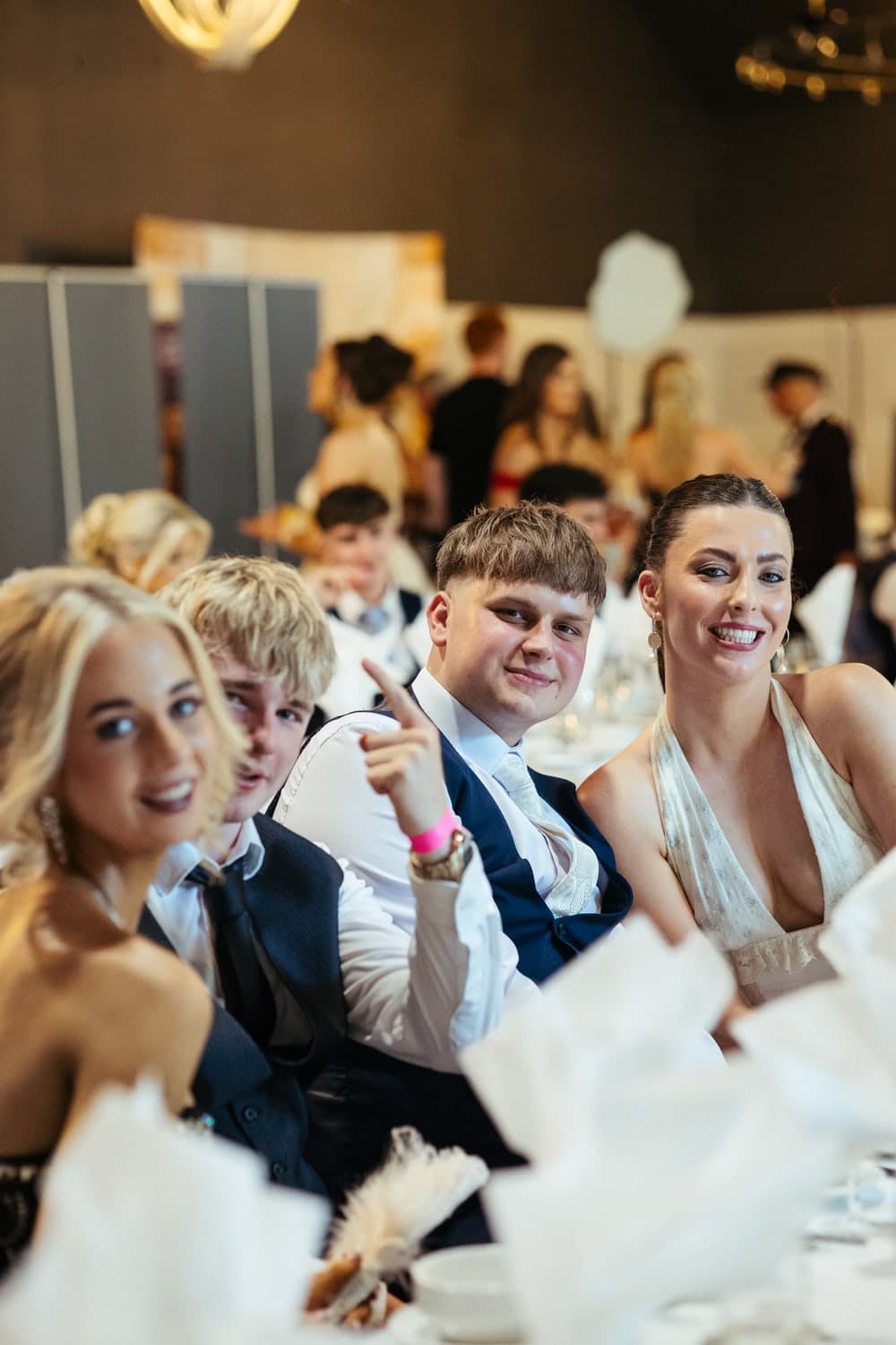 Students enjoying dinner at a DebsGuru event